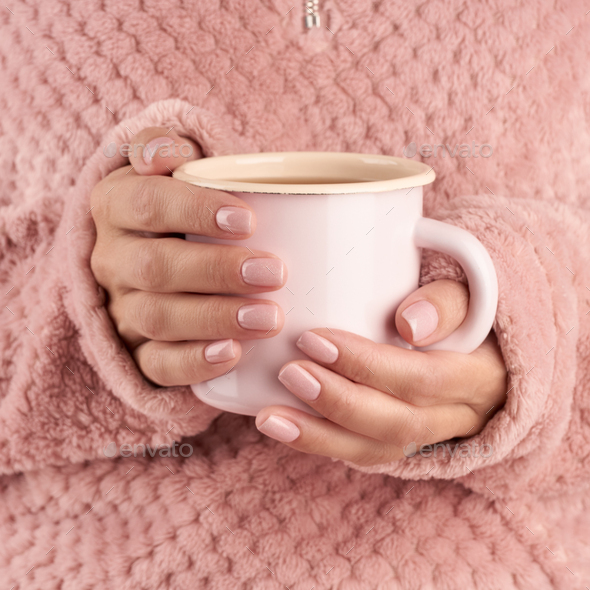 hands holding cup of tea Stock Photo by Natabuena PhotoDune